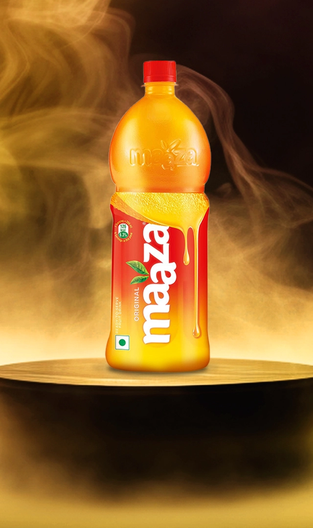 Maaza mango drink bottle in golden light